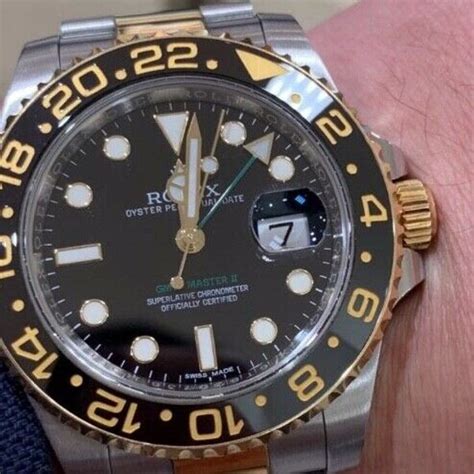 Rolex GMT Master II Z754008 gold & stainless steel with.